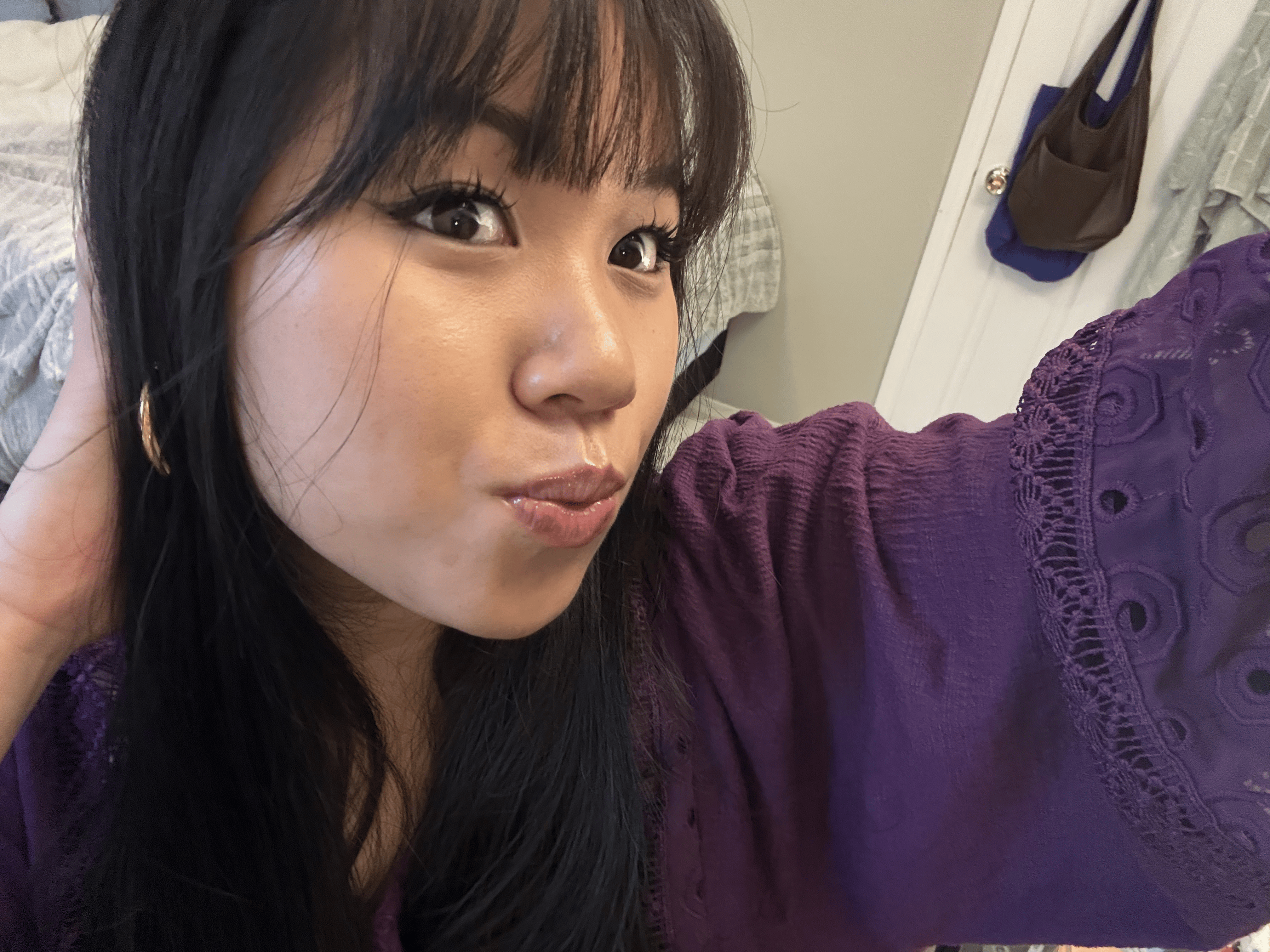 Julia Nguyen in a casual selfie (with bangs)